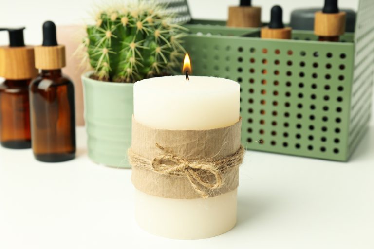 Concept of relaxation with aroma candle, close up