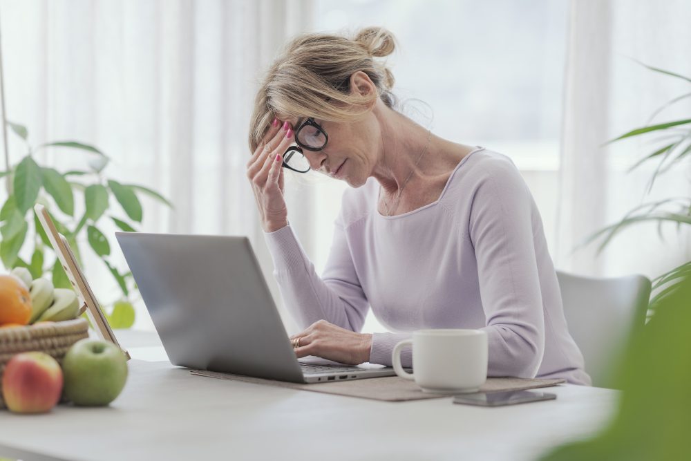 Tired woman working from home